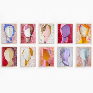 A gallery wall art withset of ten framed high quality art prints of original mixed media collages in vivid colors in antrazit blue, brick red, pink, pastel violet, orange, yellow, beige, dove grey and mango.