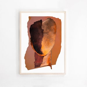 A high quality earth color large wall art print of an original abstract portrait in shades of vivid brown, varying from dark wood to blazing orange. A reddish accent drop spills out from the torn paper, random-shaped, faded persimmon background.