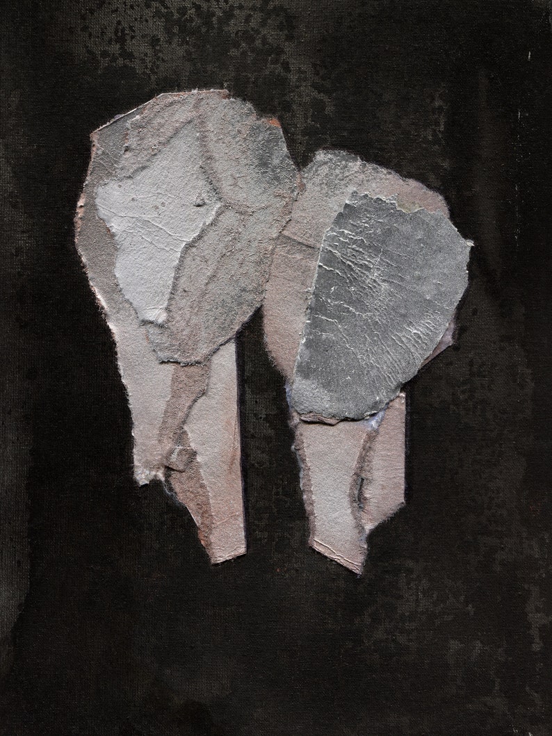 A modern romantic abstract portrait of a love couple in off white, greige, cinnamon and silver grey on a brushed tricorn black background. The two heads  are composed of torn paper layers with exposed grungy edges. The texture is rough and 3d mural.
