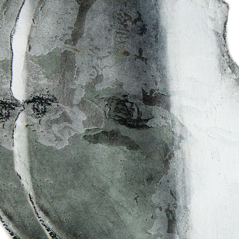 A detail of a high quality fine art print of a monochrome abstract group portrait in grayscale, black and white. The thick torn paper layers are brushed in black/white and green-gray, have charcoaled edges, mural and grainy texture and opaque finish.