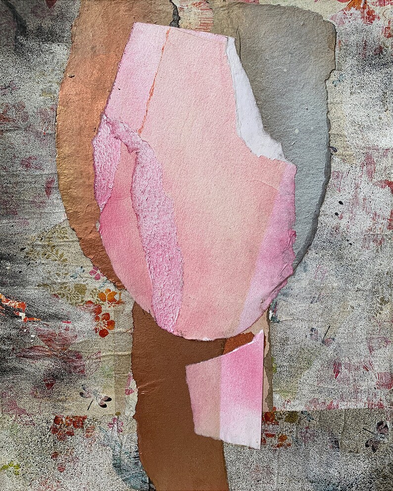 May include: Abstract art collage with pink, brown, and gray paper pieces layered on top of each other. The paper has a textured, handmade look.