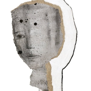 A modern statement abstract portrait in shades of gray. The artwork is one layer of ripped thick paper on a bigger white head shape outlined with charcoal. The exposed rough paper edges have golden hue. The facial features are sketched with graphite.