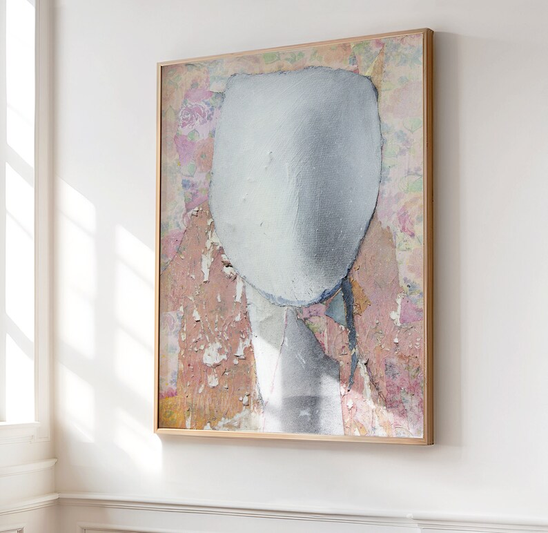 May include: A rectangular framed wall art piece featuring a large, central, textured silver-grey oval shape layered over a background of faded floral patterns in shades of pink, green, and yellow, with visible peeling paint and distressed textures.