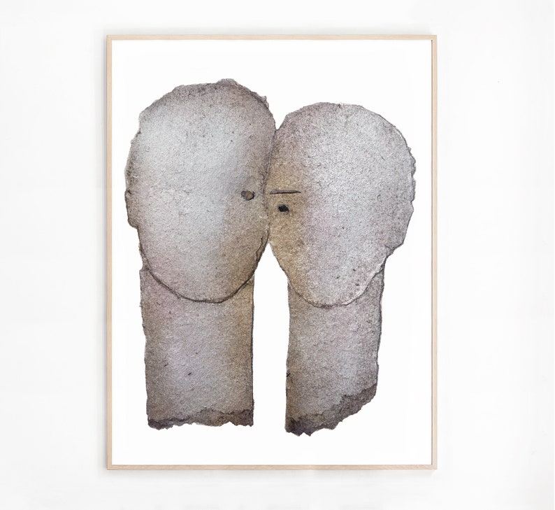 A maple wood framed high quality art print of a romantic abstract portrait of a love couple in shades of grey with silver finish on white. The two heads are composed of torn rough paper layers with exposed grungy edges and two eyes for accent.