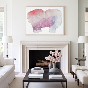 A wood framed high quality art print of a romantic abstract portrait of a kiss in off white, coral and lavender blush pink and pastel violet on white. It's composed of one piece torn paper with rough edges, with accents of fine bluish mist.