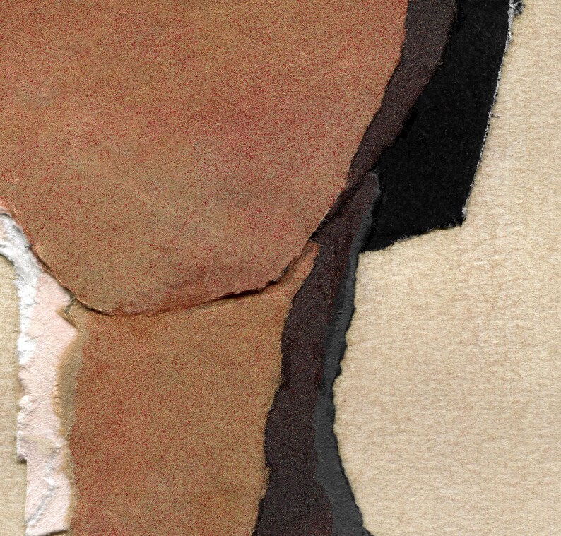 May include: Abstract art piece featuring torn paper in shades of brown, black, and beige. The composition includes layered textures and rough edges, creating a collage-like effect. The artwork has a minimalist aesthetic.