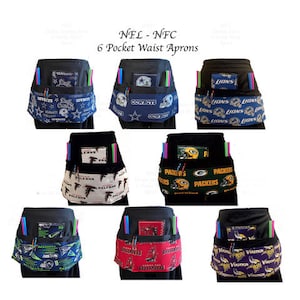 May include: Six black waist aprons with six different NFL team logos. The logos are Cowboys, Lions, Falcons, Packers, Vikings, and Saints. Each apron has six pockets.