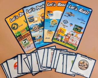 May include: A set of colorful game cards with different attractions and prices. The cards feature images of amusement parks, zoos, beaches, and national parks. The cards are labeled "Let's Zoo", "Let's Park", "Let's Beach", and "Let's Ride!"