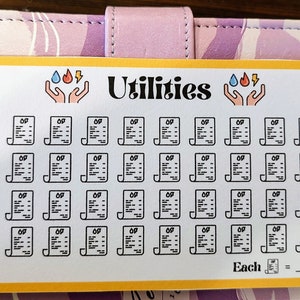 May include: A white sticker sheet with a yellow border. The sticker sheet has the word "Utilities" in black bold letters. There are 48 small black and white icons of utility bills. The sticker sheet has a graphic of two hands holding a water drop, a flame, and a lightning bolt. The text "Each =" is at the bottom of the sticker sheet.