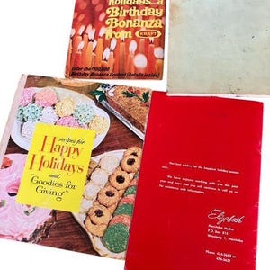 May include: A collection of vintage cookbooks and menus. One cookbook cover reads "Festive Menus for brighter holidays...a Birthday Bonanza from KRAFT." Another reads "Recipes for Happy Holidays and Goodies for Giving."