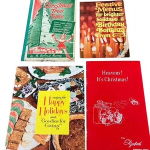 May include: A collection of vintage cookbooks with festive themes. Titles include "Christmas Tree Time," "Festive Menus," and "Happy Holidays." The books feature colorful covers with illustrations and text, perfect for holiday recipes and celebrations.
