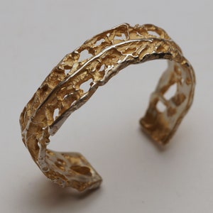 Silver bangle with partial gilding and interesting wild structures image 1