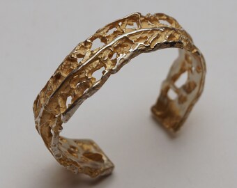 Silver bangle with partial gilding and interesting wild structures