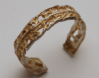 Silver bangle with partial gilding and interesting wild structures