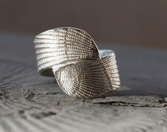 wide silver ring with shell structure ergonomic shape with pleasant wearing characteristics matte surface with polished elevations