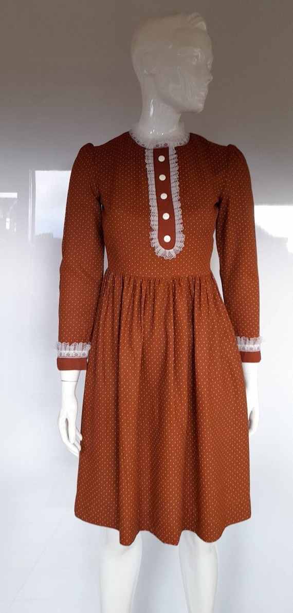 Polka dot tan dress hotsell