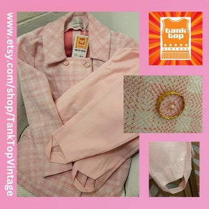 May include: A pink and white gingham jacket with a matching pink skirt. The jacket has a double breasted fastening and a collar. The skirt has a simple design with a straight hemline. The set is vintage and in good condition.