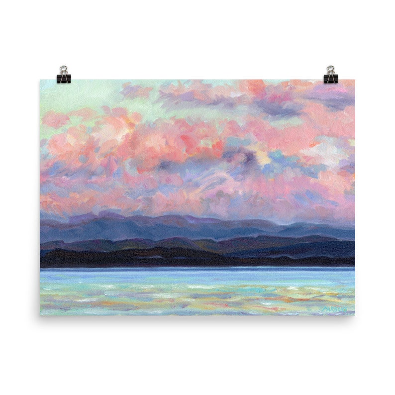 May include: A painting of a landscape with a pink and purple sky, a dark blue mountain range, and a light blue body of water.
