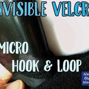 Può includere: Primo piano di tessuto nero a micro gancio e anello. Il tessuto è etichettato "MICRO HOOK & LOOP" e "INVISIBLE VELCRO".