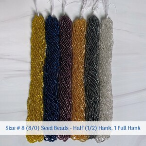 May include: Six strands of seed beads in various colors, including gold, blue, purple, and silver. The beads are size 8/0 and are packaged in half and full hanks.  Size # 8 (8/0) Seed Beads - Half (1/2) Hank, 1 Full Hank