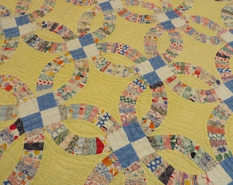 Antique Quilt, Double WEDDING RING Pattern  //  Many Feed Sacks, Multi Colors, YELLOW, and Blue, Mostly 1930s & 40s Fabrics 80" x 69"