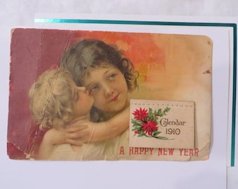 Miniature 1910 Calendar - Mounted on antique POSTCARD - Calendar is just 1 3/4" wide; 1 1/4" Tall - Very TINY Calendar - New Years Postcard