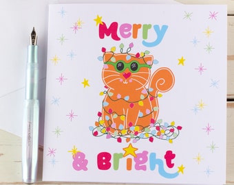 Tarjeta de Navidad colorida para un amante de los gatos. Un gato descarado que es alegre y brillante