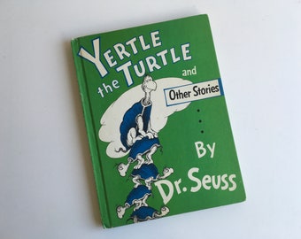 May include: A green book cover with the title "Yertle the Turtle and Other Stories" by Dr. Seuss. The cover features an illustration of a turtle standing on top of other turtles.