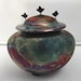 see more listings in the funeral urn section