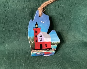 Hand painted Round Island Lighthouse ornament on Michigan shape bisque pottery about 3”.