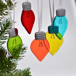 Glass Christmas decoration in the shape of a light bulb