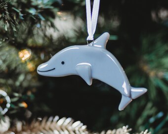 Decorative hanging glass dolphin