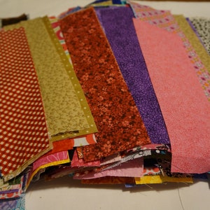 SCRAP LOT ~ 46 2&quot; X 10&quot; STRIPS scraps 100% cotton Quilt Fabric (No Duplicates)