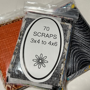 May include: A package of 70 fabric scraps, measuring 3x4 to 4x6 inches, in various patterns and colors. The package is labeled "70 Scraps 3x4 to 4x6".
