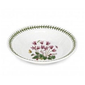 May include: A white ceramic bowl with a green rim and a floral design featuring pink flowers and green leaves. The bowl is perfect for serving salads, pasta, or other dishes.