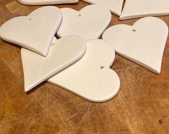 Heart Shapes x 8 (5x5cm) decorate yourself,  made with earthenware clay, can be glaze fired.