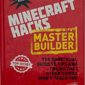 May include: A red book titled "Minecraft Hacks Master Builder" with white and yellow text. The cover includes the phrases "Design! Decorate! Build!" and "Top Secret". The book is a guide to tips and tricks.