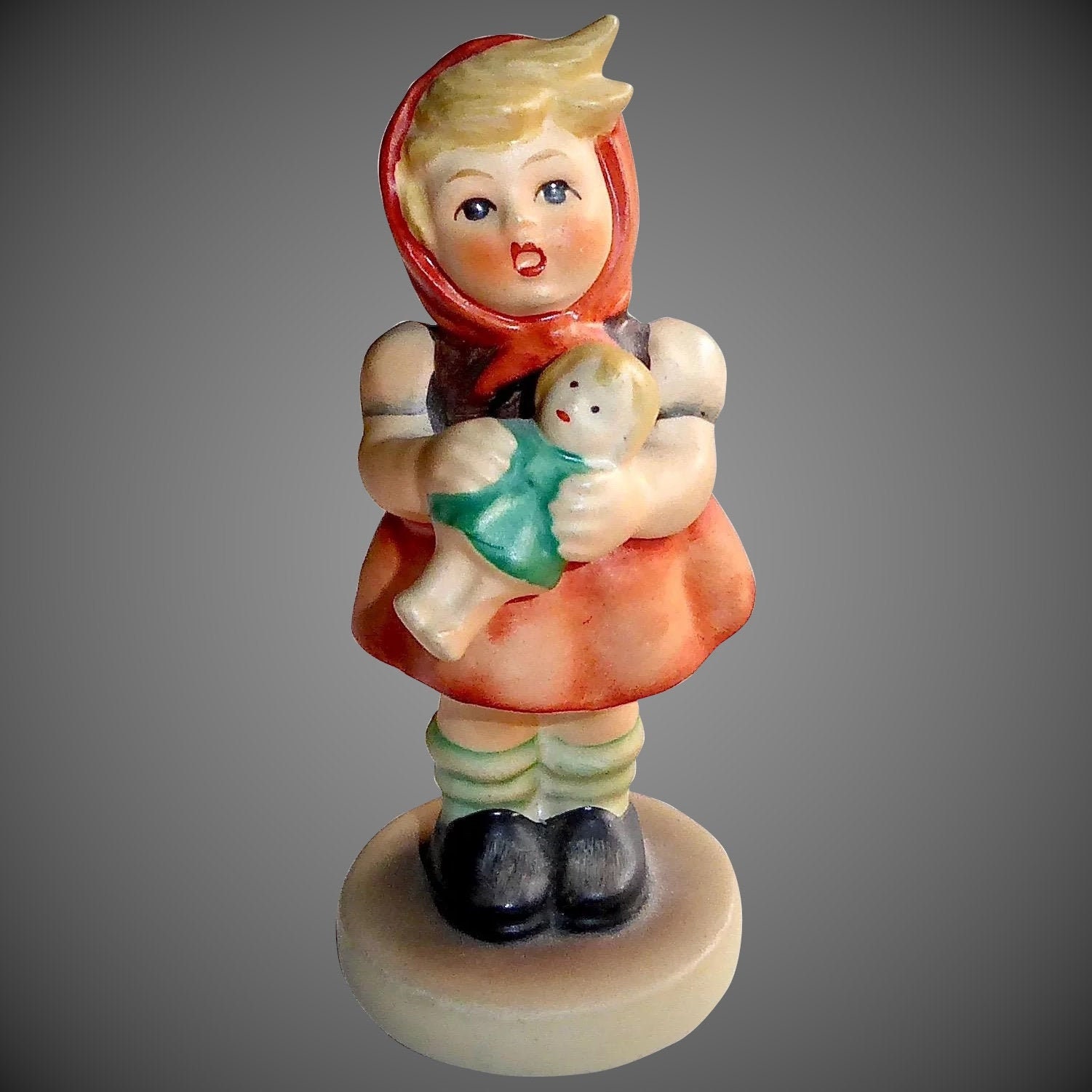 Hummel girl cheap with doll