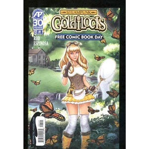 May include: A comic book cover featuring a blonde woman in a steampunk-inspired outfit, holding a butterfly net. The title "Steampunk Goldilocks" is displayed above her, with the text "Free Comic Book Day." Butterflies and a waterfall are in the background.