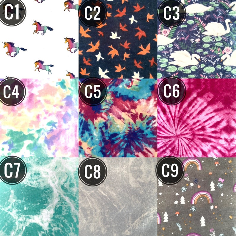May include: Nine fabric swatches with different patterns. The patterns include unicorns on white, orange and white birds on navy, swans on a floral background, tie-dye, and a rainbow and trees on gray.