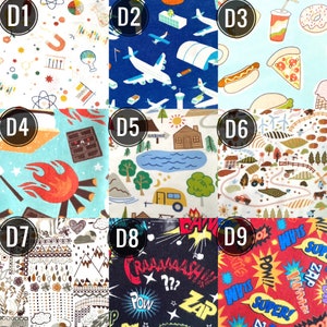 May include: A collection of nine fabric swatches with various patterns. Designs include airplanes, science symbols, food items, camping scenes, comic book exclamations, and mountain landscapes. Each swatch is labeled with a letter and number.
