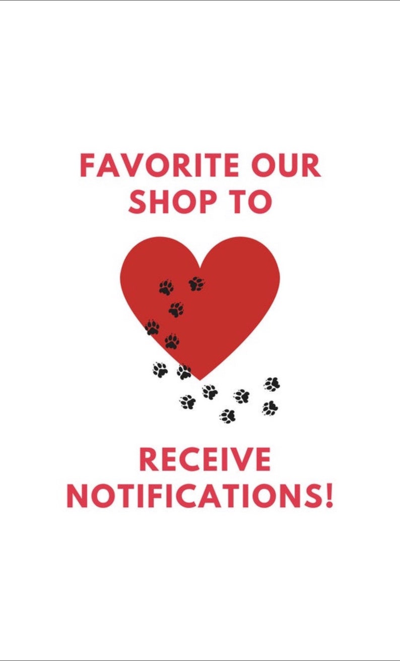 May include: White background with red text and a red heart. The text reads "FAVORITE OUR SHOP TO RECEIVE NOTIFICATIONS!". The heart has black paw prints falling from it, suggesting a pet-related theme.
