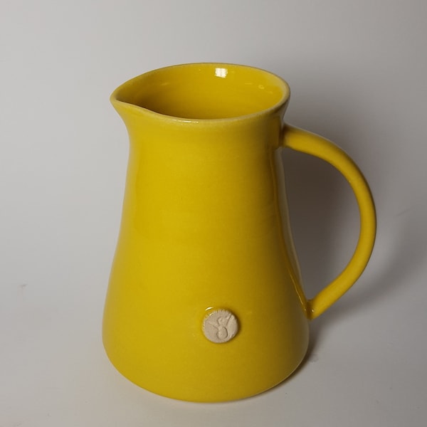 Sunny yellow jug with handle for milk, cream, whisky, water etc. Handmade ceramic pottery. Sunny yellow glaze