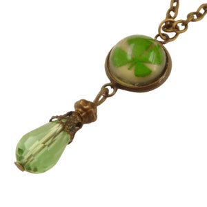 Lucky charm necklace with real four-leaf clover glowing green bronze gift idea for wife and girlfriend