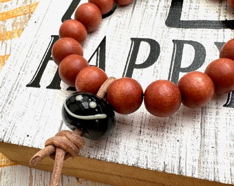 HaPPy bracelet - bracelet made of wooden beads with handmade glass bead -18 cm- smiley bracelet