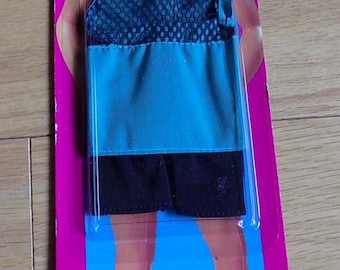 Favoritos de moda vintage de Ken: Coleccionable de Mattel de 1995, conjunto nuevo de shorts y camiseta sin mangas.