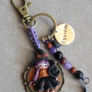 bag charm with charms, witch doll, brass Engraved Tag, violet cord, Handmade Polymer Clay Doll, personalized Gift, gift for witch girl