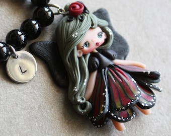 fairy necklace , polymer clay doll necklace, black beads necklace, initial necklace, handmade dolls, clay dolls, fairy jewels, figurine