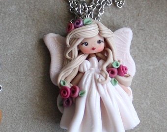 necklace in stainless steel , with doll in polymerclay, totally by hand, artisan crafts, made in italy, claydolls, unique gift, white fairy