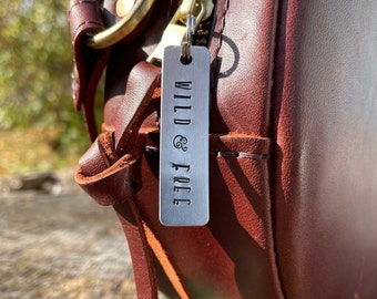 Travel Gift | WILD & FREE Hand Stamped Charm | Zipper Pull | Key Chain Tag | aluminum tag for bags, suitcase, backpack | Purse Charm |